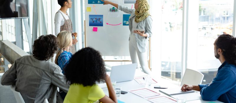 mixed-race-businesswoman-in-hijab-giving-presentat-2021-08-28-16-48-01-utc